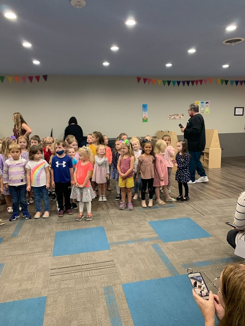 Group gathered in a community hall